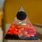 Obsidian Sphere With Red Coral Orgone Pyramid